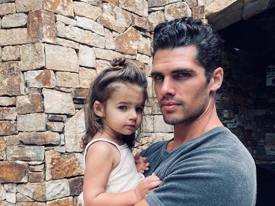 Brian Shimansky is carrying Siena Shimansky in the picture.